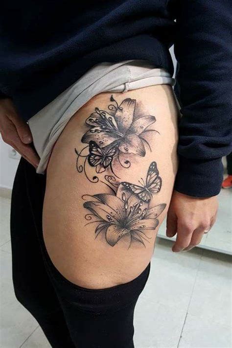 female tattoo designs for thigh|thigh feminine female body tattoos.